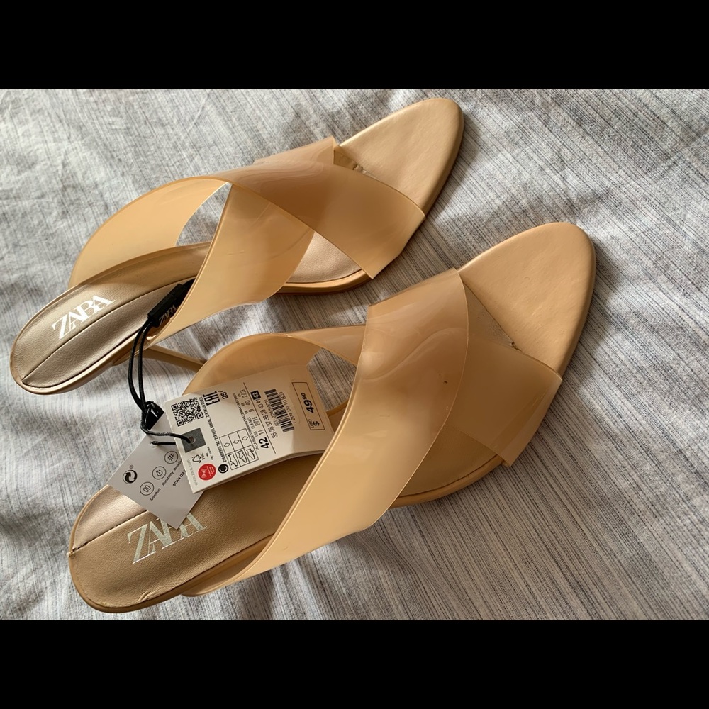 Nude lucite mules